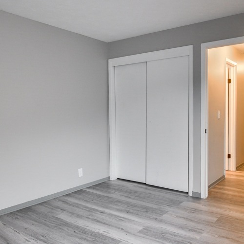 Bedroom with natural lighting and high ceilings Bedroom with natural lighting and high ceilings