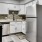 Well-lit kitchen with ample counter space