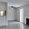 Open space living area with natural lighting and fireplace